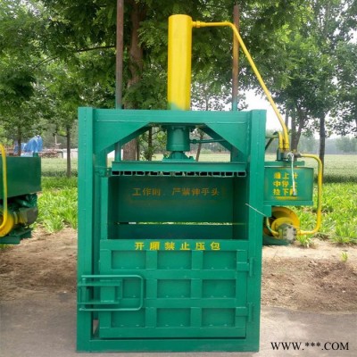 温州油漆桶压扁机 服装边角料打包机 大型废纸液压打块机工作视频图2