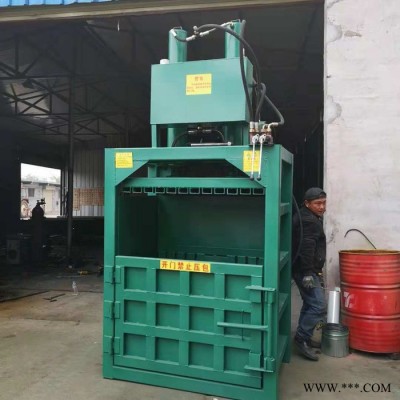 温州油漆桶压扁机 服装边角料打包机 大型废纸液压打块机工作视频图4