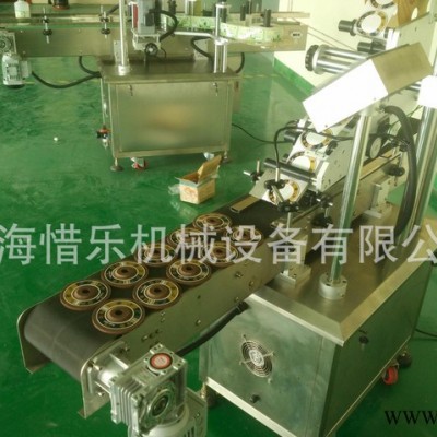 上海百叶片圆标平面贴标机  千叶轮商标自动贴标机图2