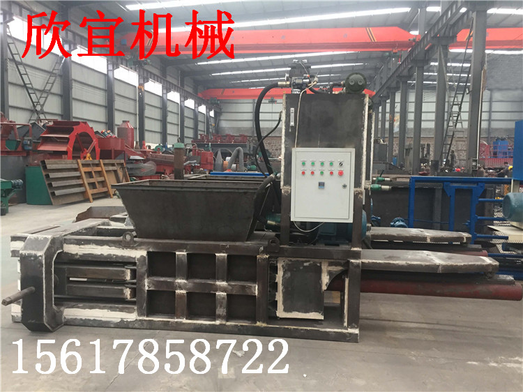 120型多功能卧室废纸箱打包机 易拉罐打包机 秸秆玉米打包机车间一角
